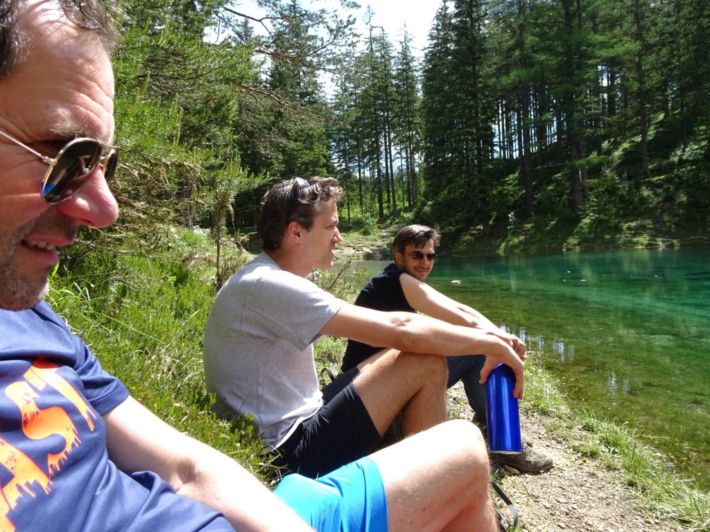 Hans, Bernhard, Robert C. are enjoying the sun at the score