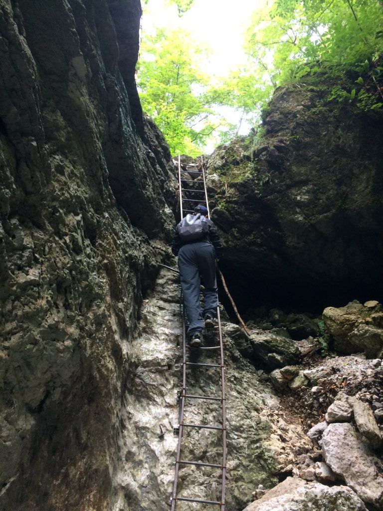 Rene climbing up the iron ladder