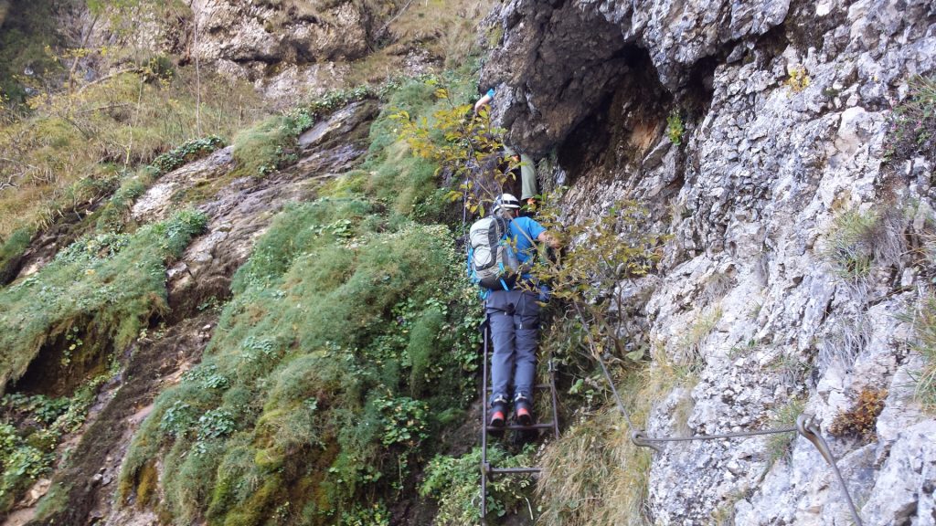 Hannes and Stefan on the very wet iron ladder