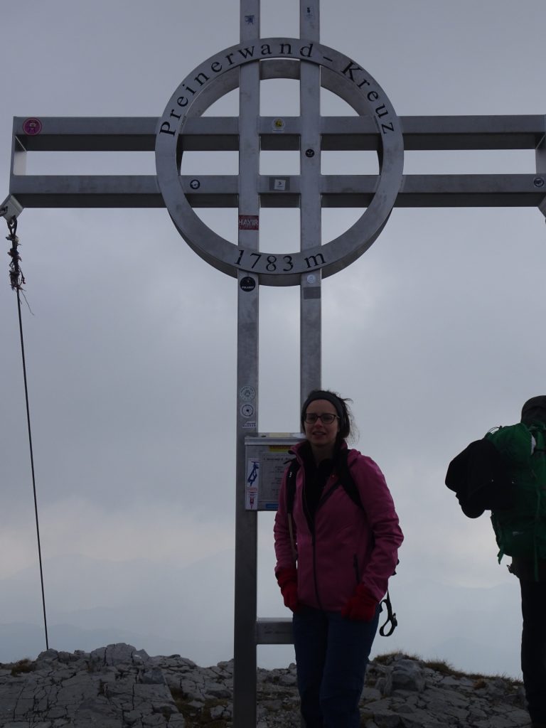 Debora at the Preiner Wand summit cross