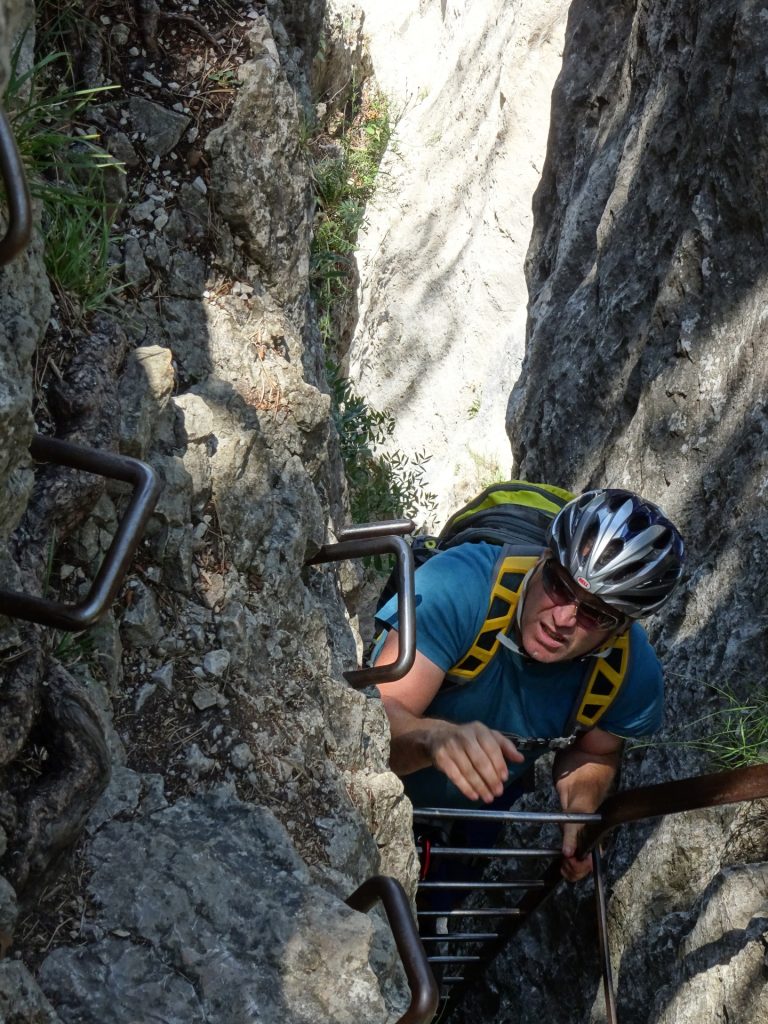 Robert climbing up the ladder (crux)