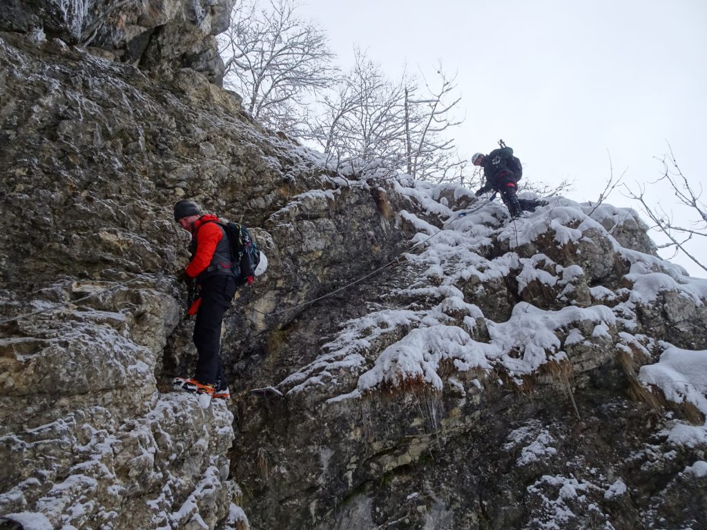 Hannes and Robert on the icy rock at the entrance