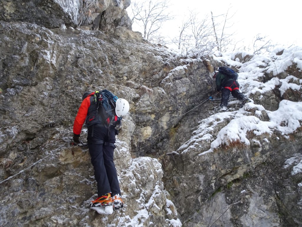 Hannes and Robert on the icy rock at the entrance