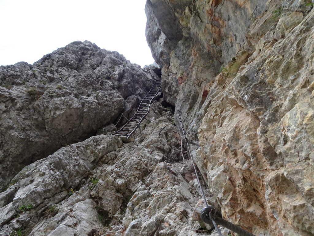 The first iron ladder (B) after the traverse