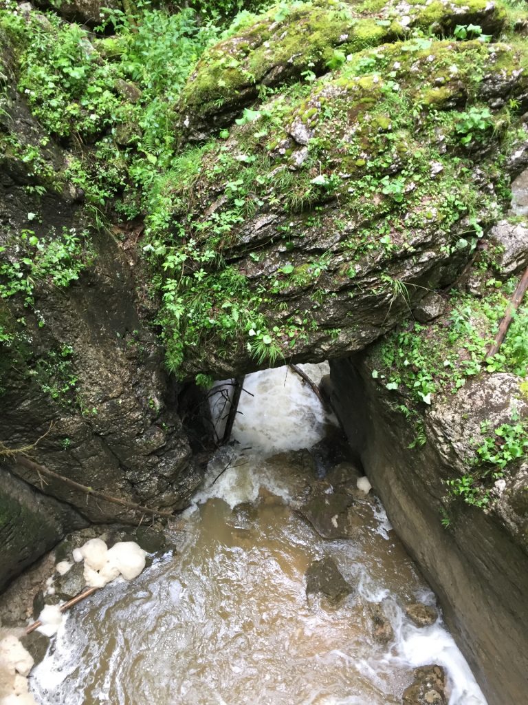 Water flows through a cave