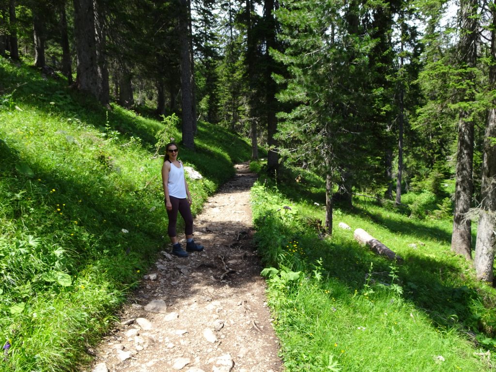 Debora enjoys the hike in stunning green nature