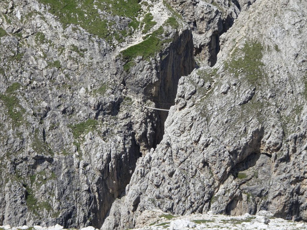 The rope bridge of the via ferrata is very well seen from here!