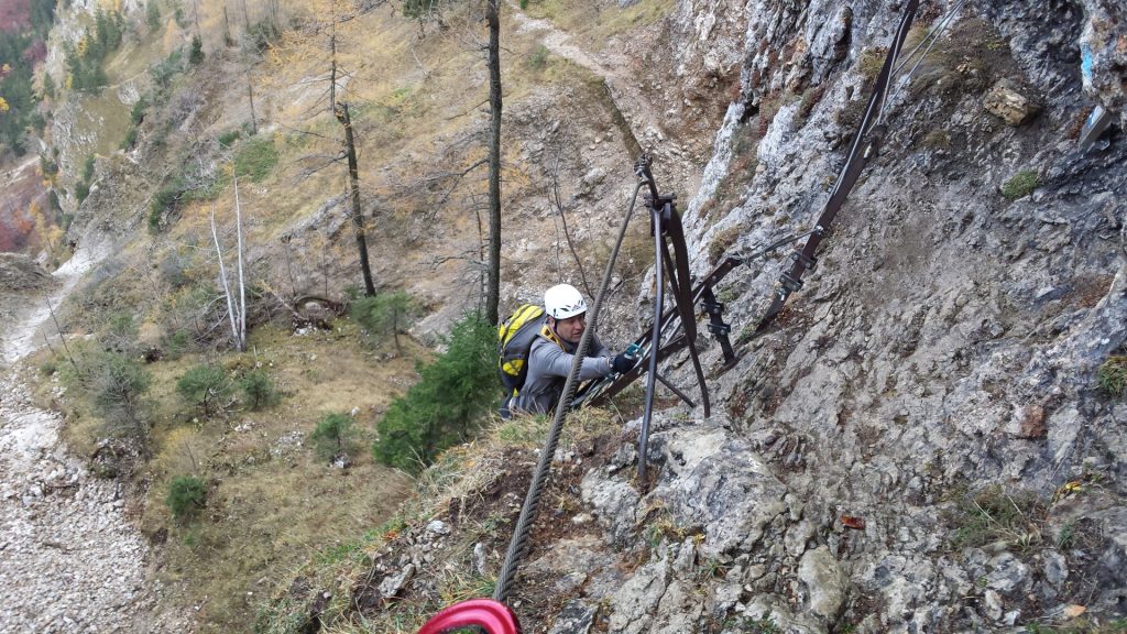 Robert climbing up the long ladder towards "Elsa-Rast"