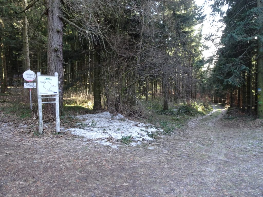 Turn right and follow the blue-white marked trail downwards