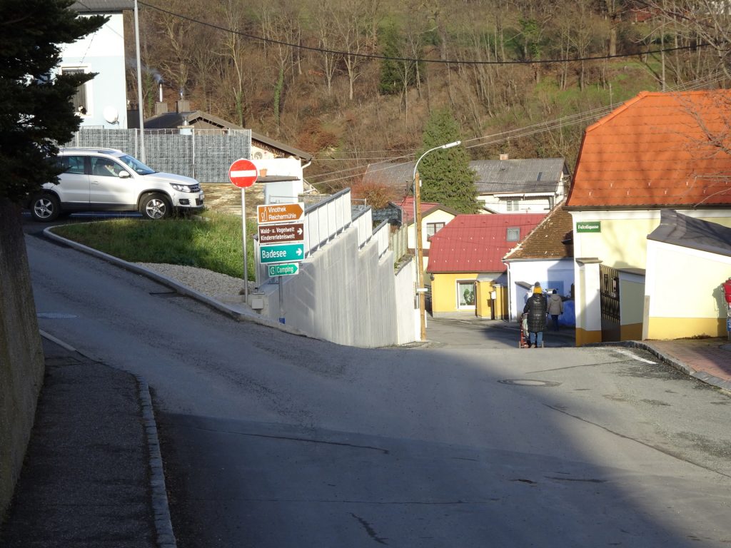 Turn left here and follow the street back to the parking