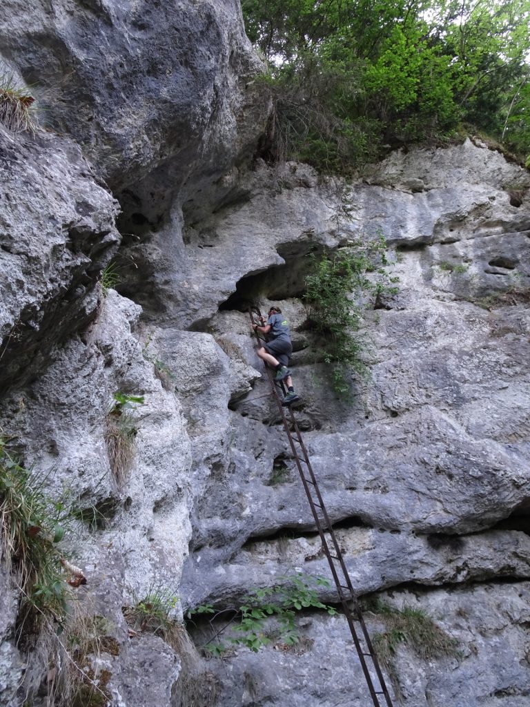 Climbing into the cave