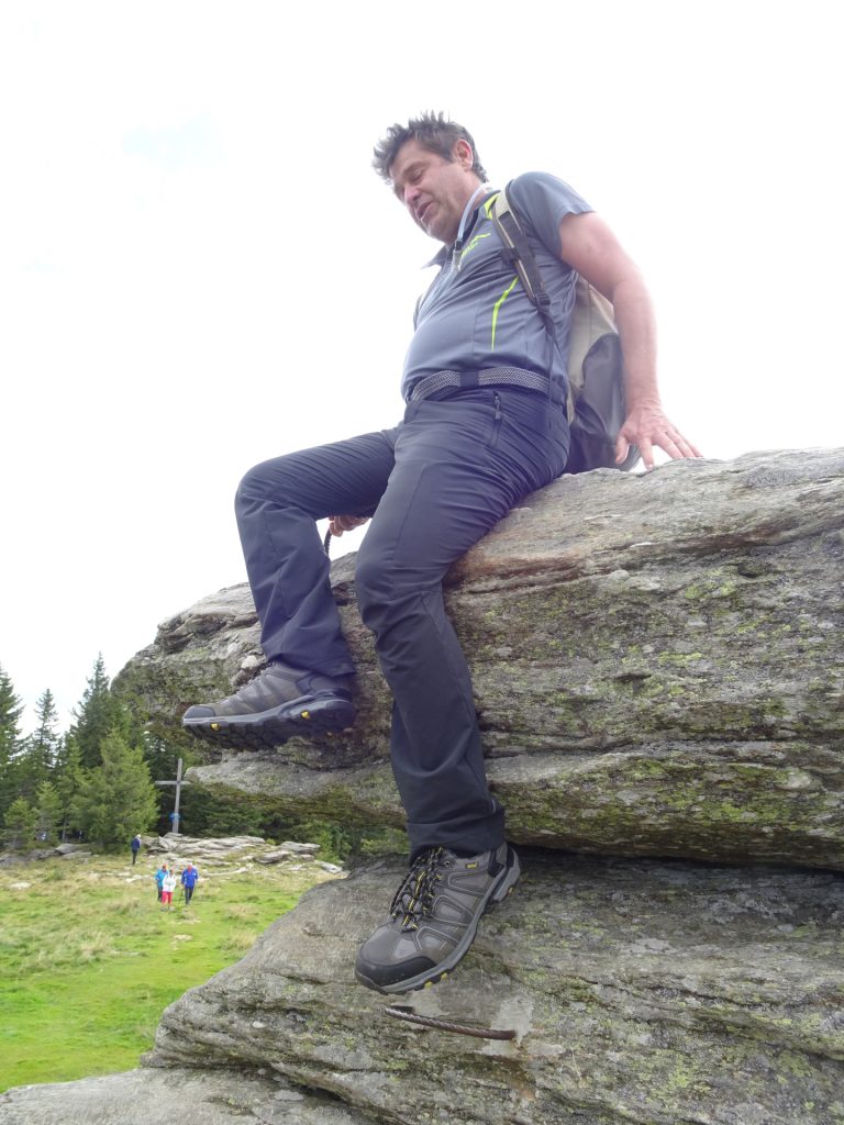 Robert climbs down "Teufelstein"