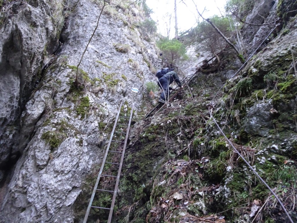 Climbing down another two iron ladders