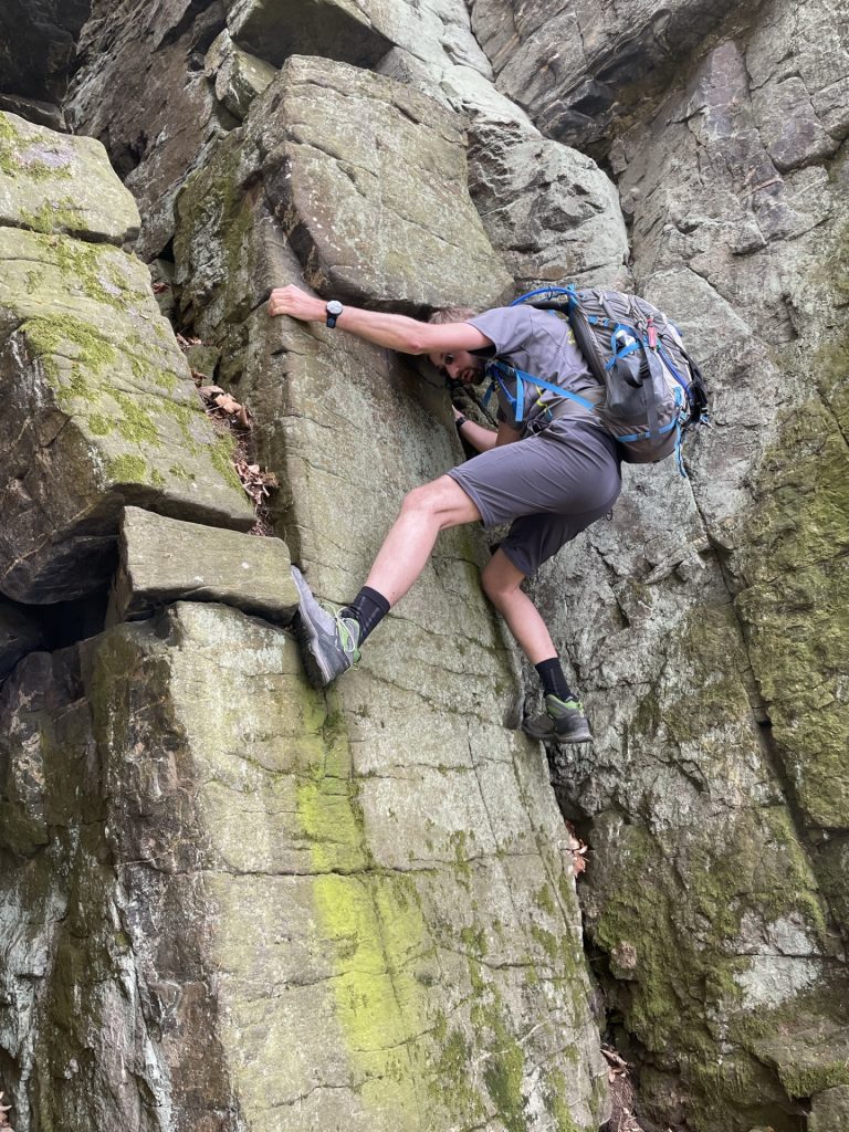 Stefan climbs up one of the easier routes (UIAA III) at the climbing area next to <i>Teufelsrast</i>