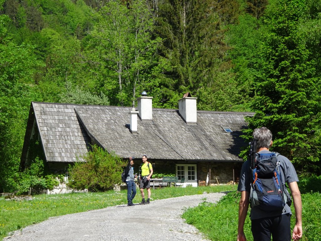 Amitabh and Hans are posing in front of the nice house