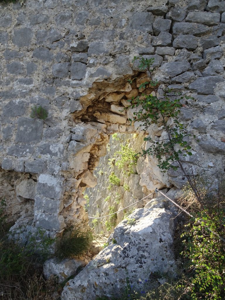 Through the hole in the wall (end of the <i>Via Ferrata Fortica</i>)