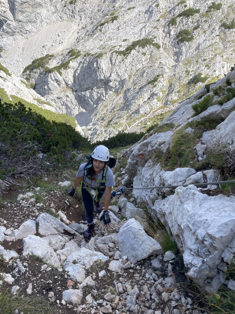 Eliane climbs up <i>Vellacherturm</i> Via Ferrata