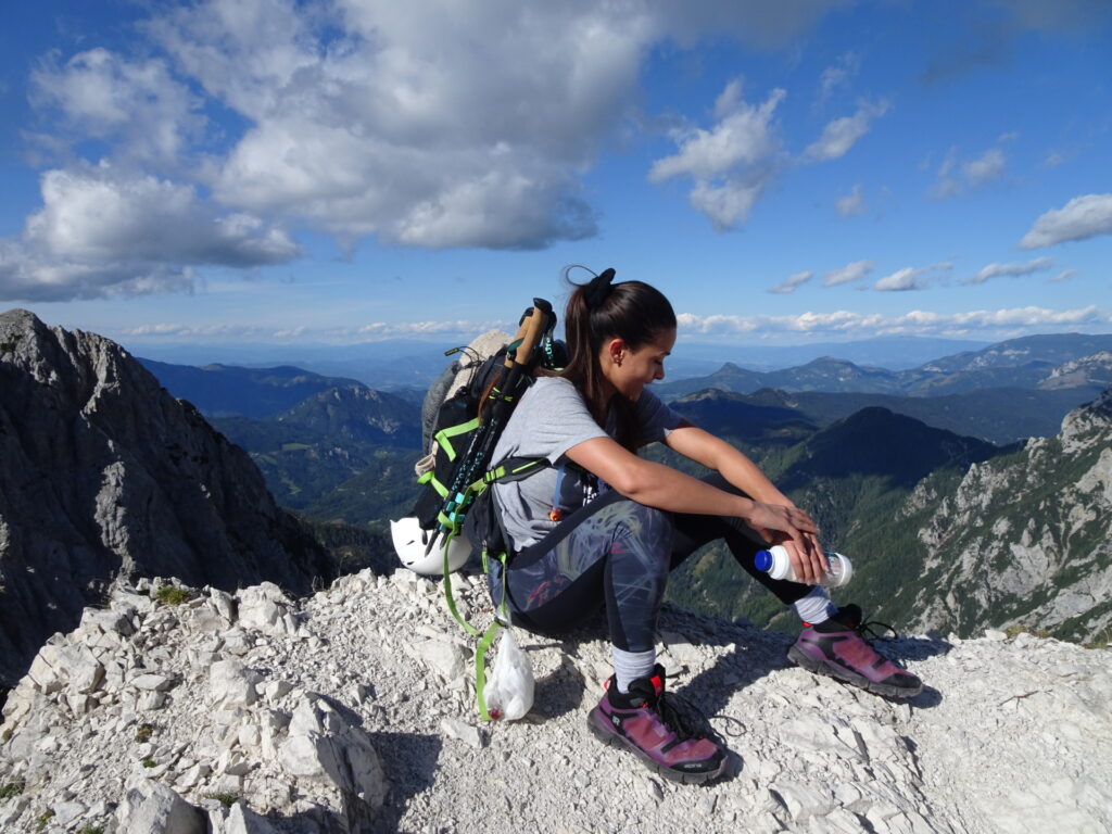 Eliane enjoys a break at the summit of <i>Ledinski vrh</i>