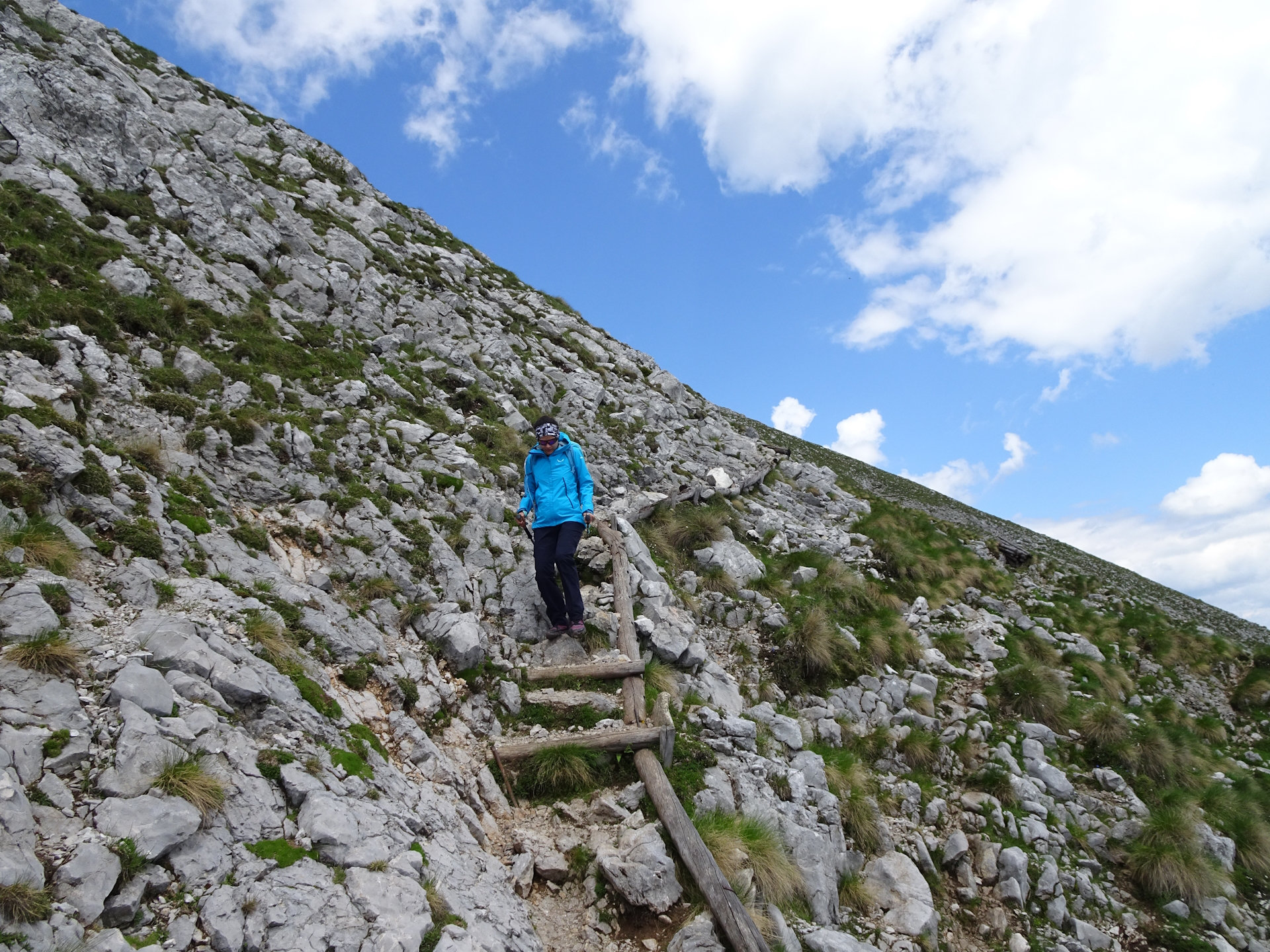 Eliane on the trail down from <i>Veliki vrh (Begunjščica)</i>