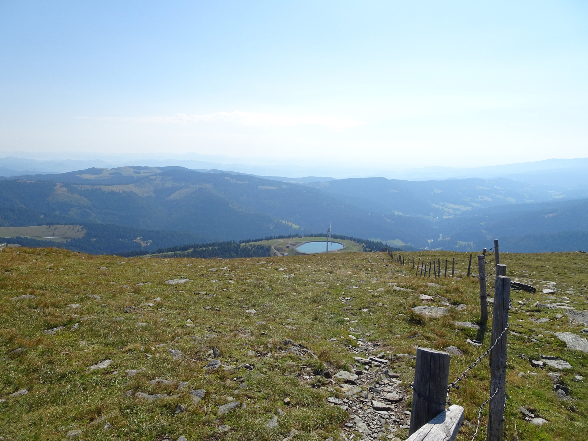 View back to the water reservoir from the trail up to <i>Speikkogel</i>